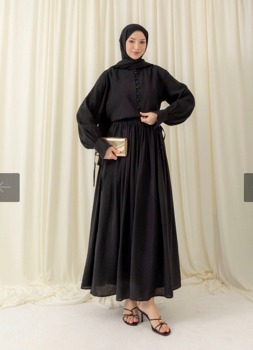 Zweiteiler mit Rock und Knopfleiste