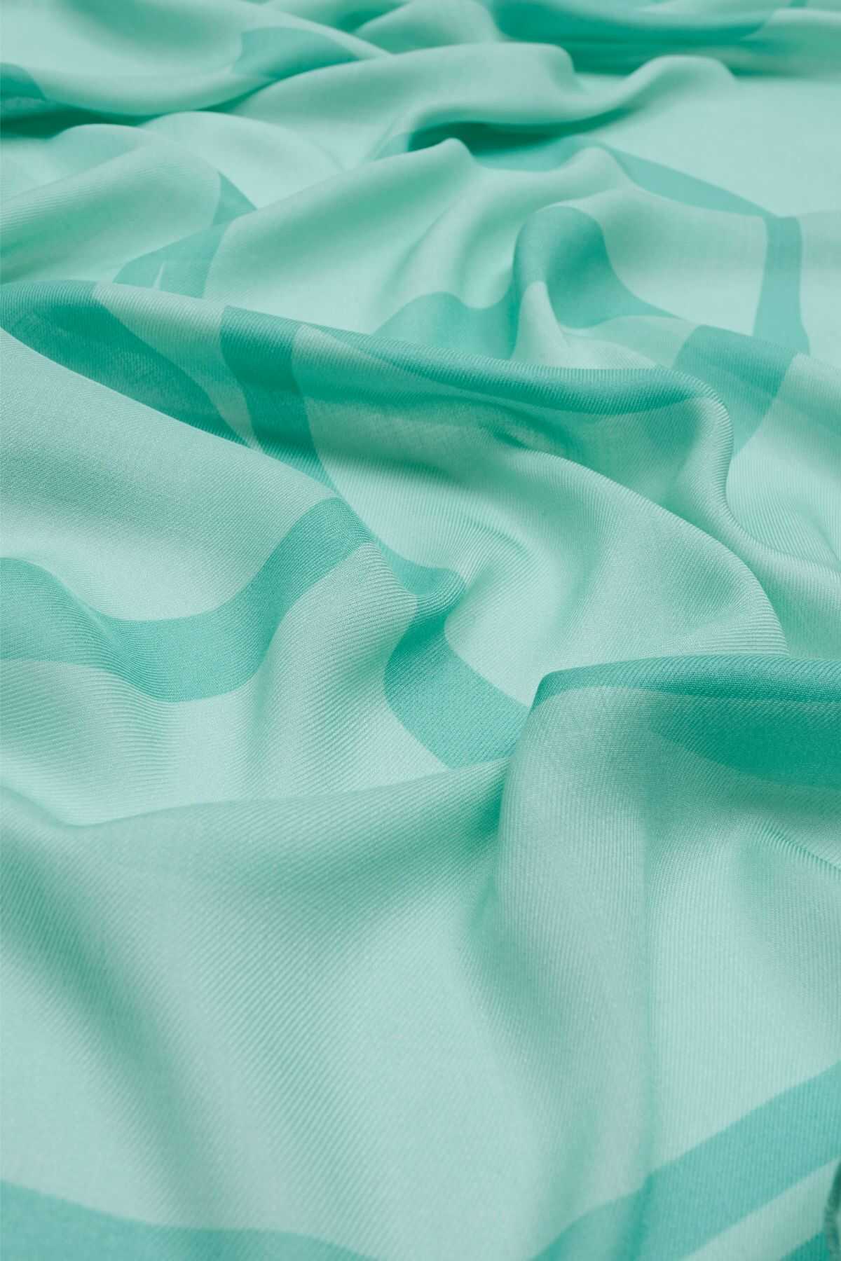 IMANNOR HIJAB DOUBLE O LOGO in turquoise