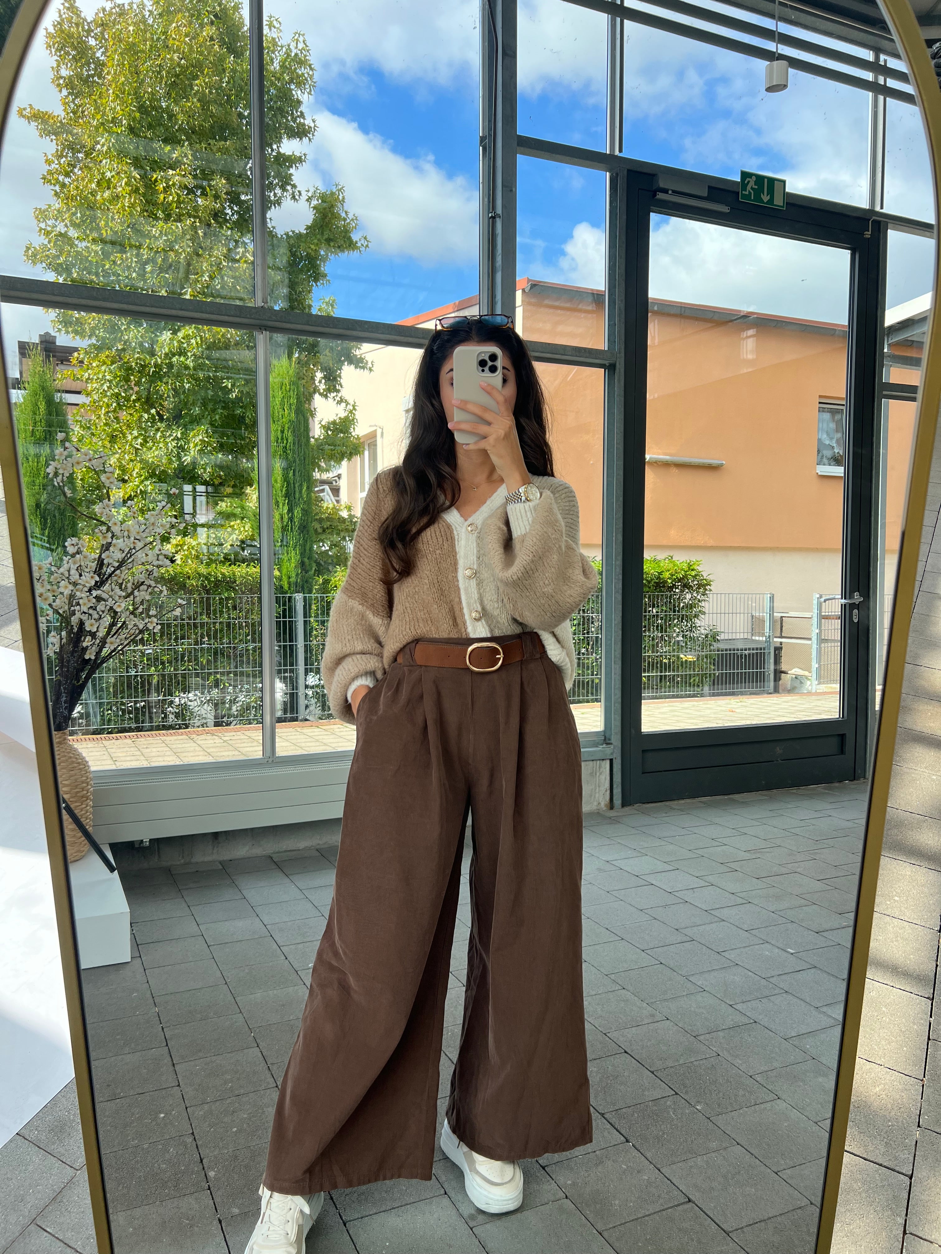 Cord pants with belts in brown