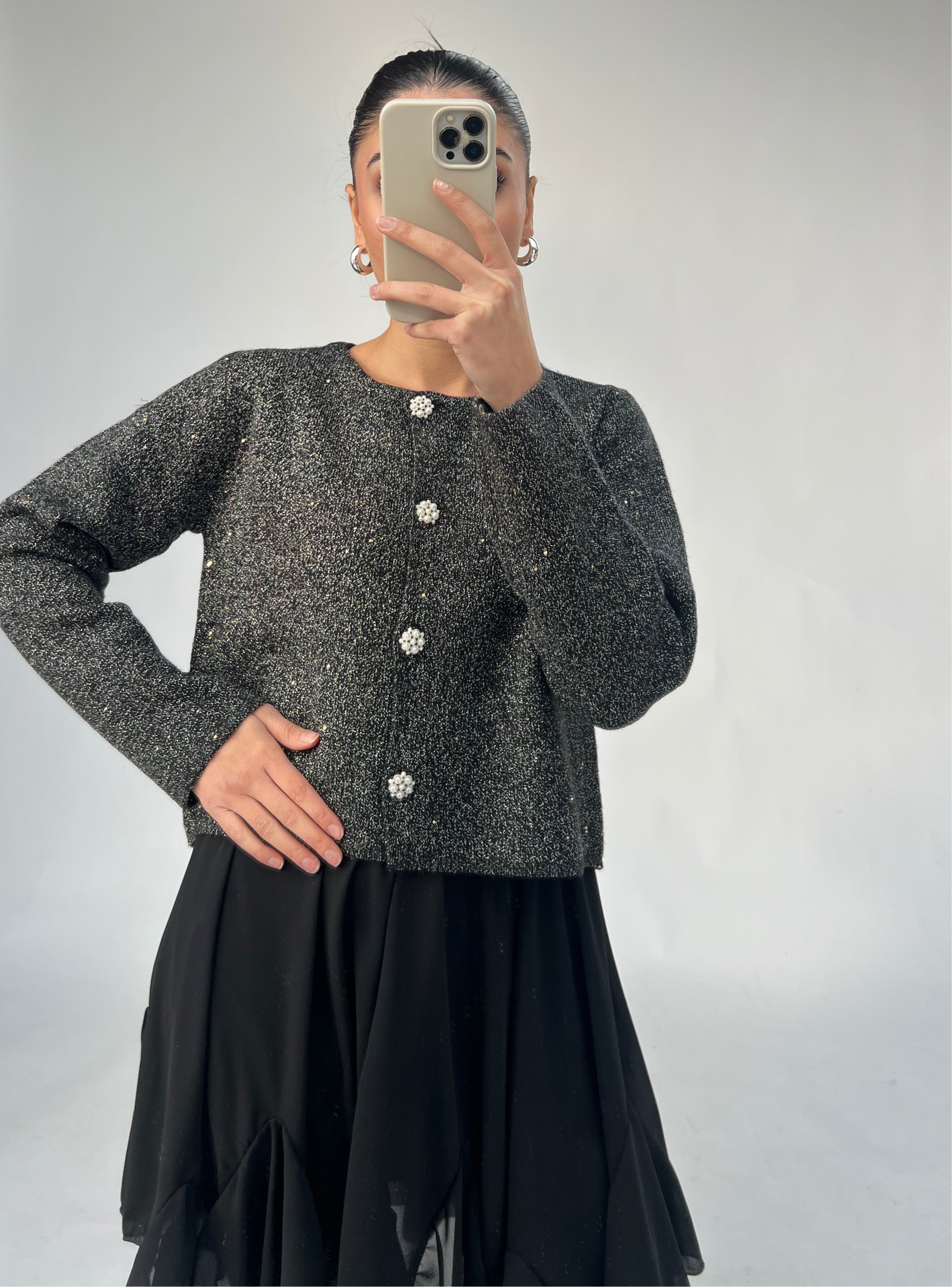 Glitzernde Strickjacke