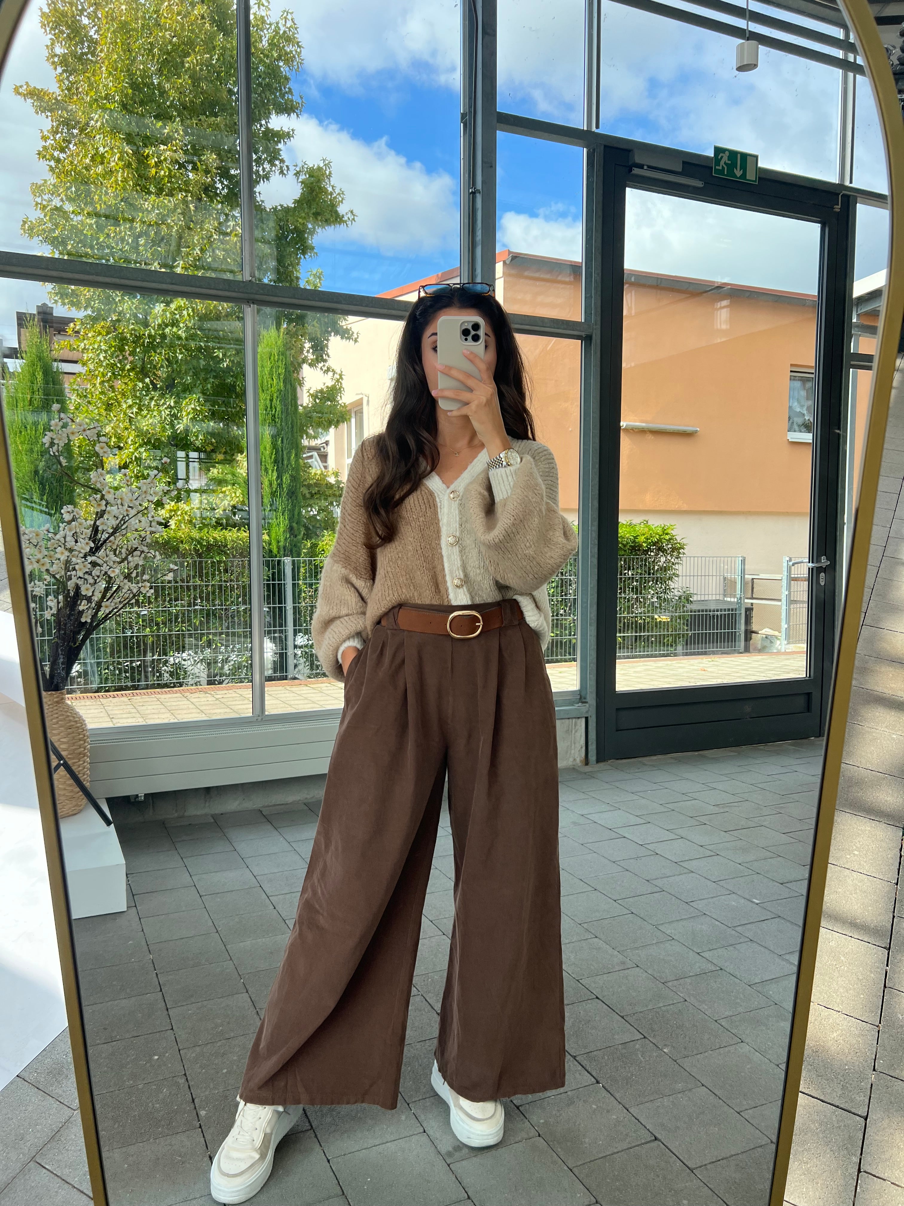 Cord pants with belts in brown